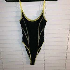 New Tiger Mist bodysuit with neon yellow lining